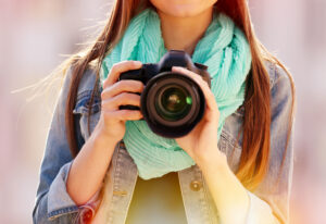 Young,Photographer,Taking,Photos,Outdoors